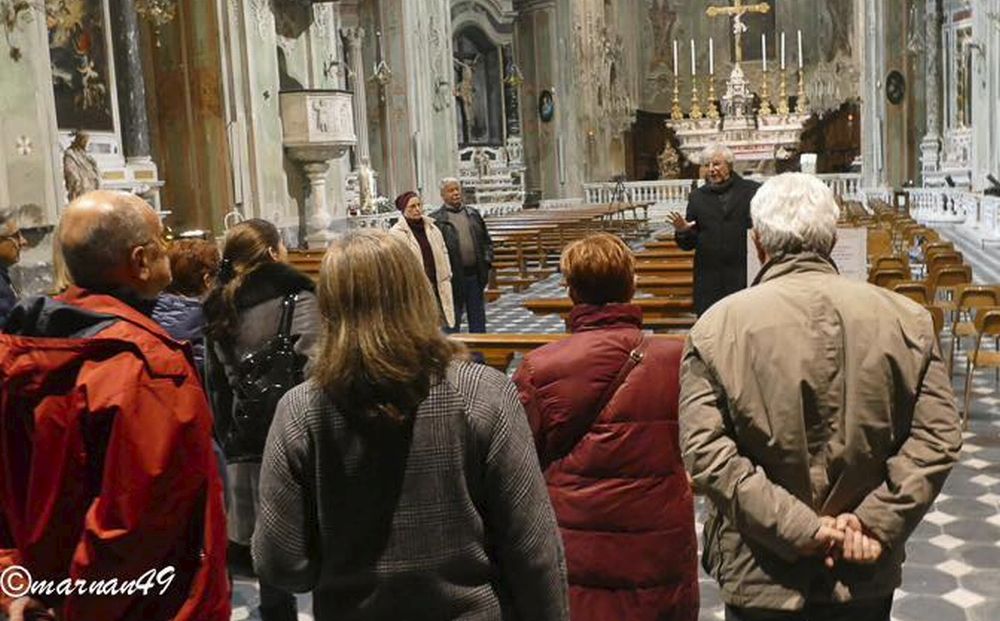 La passione di Luigi Diego Elena mentre raccontava al pubblico la storia e l’arte della chiesa di San Giovanni Battista di Cervo